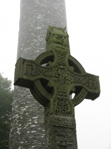 A celtic cross rises in the mists - Ireland